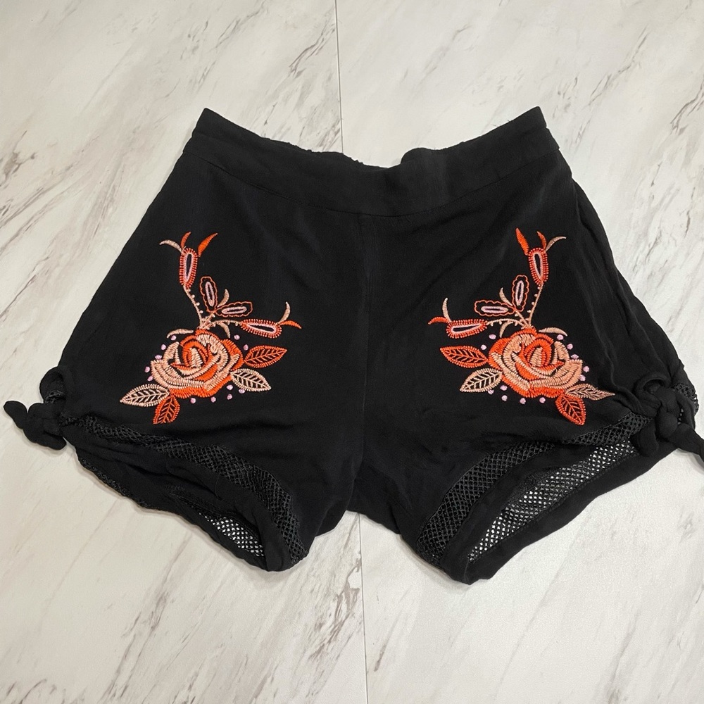 Girls black shorts with floral design